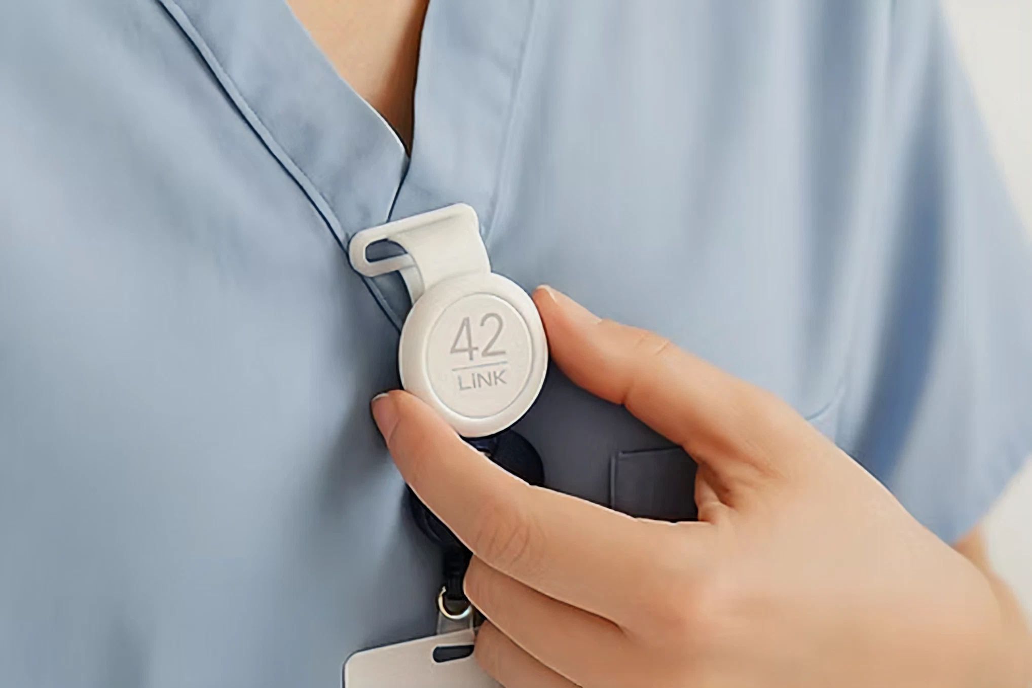 Staff holding a LINK device